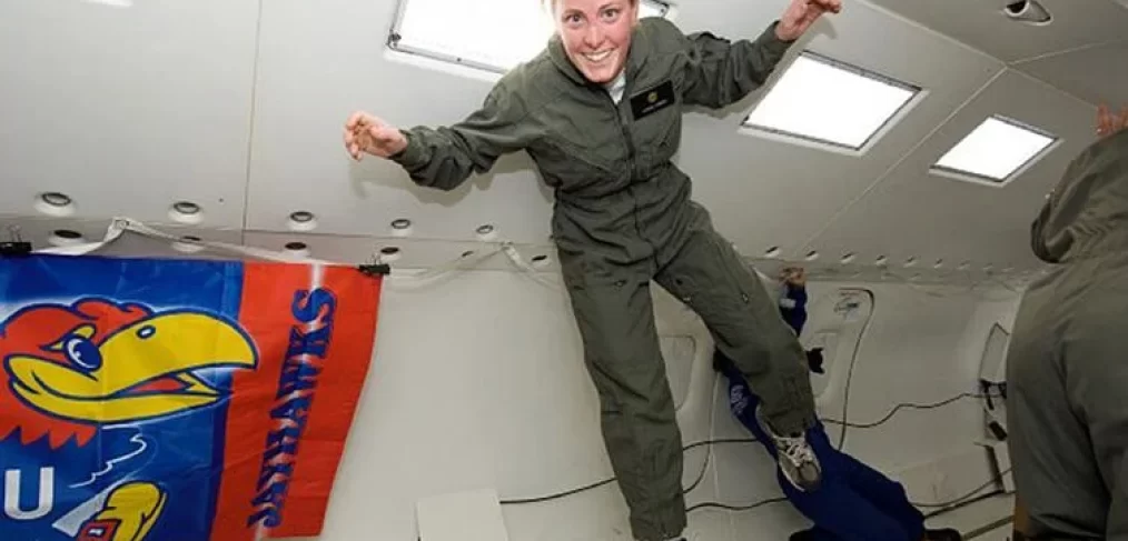 Loral O'Hara floating in the SOFIA airplane, which simulates microgravity through flying parabolic trajectories.