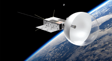 Artist's rendering of CatSat in Earth orbit, with its inflatable, beachball-like antenna deployed. Aman Chandra/FreeFall Aerospace