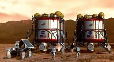 Artist's concept of possible exploration programs. Once on Mars, the crew connects the two habitats together and begin a variety of surface exploration and habitation activities. By using resources available at Mars and emphasizing the development of a robust set of surface systems, the crew's safety and the scientific and economic return of human missions to Mars are dramatically increased, while the cost of such missions decreases substantially. Remote surface exploration in regions around the habitat complex is accomplished by using pressurized rovers. These vehicles would allow the crew to explore beyond the range permitted by their space suits while allowing them to operate in a shirtsleeve environment. These images produced for NASA by John Frassanito and Associates. Technical concepts from NASA's Planetary Projects Office, Johnson Space Center (JSC).