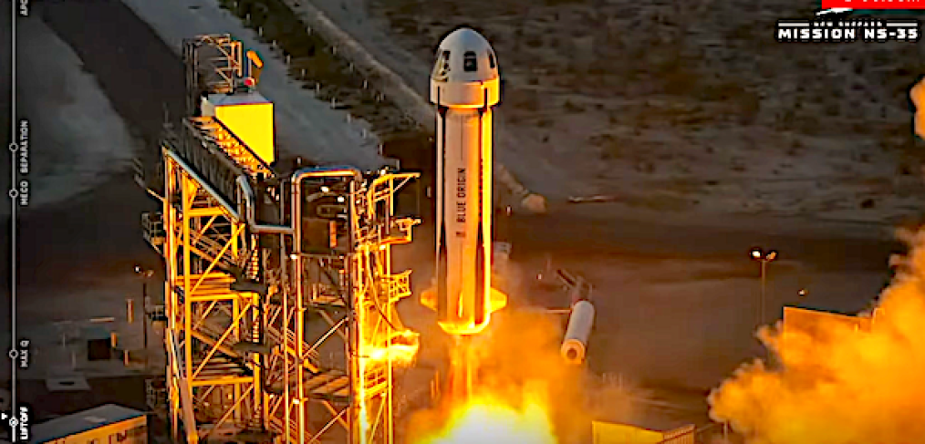 Blue Origin rocket launching from pad