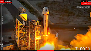 Blue Origin rocket launching from pad