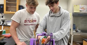 Simpson College students Brian Rollison, left, and Brennan Voss are conducting conducting research into impacts of different kinds of gravity on single-cell organisms.