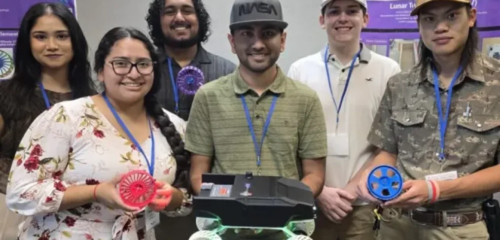 The RELLIS LTV team shows off their winning Lunar Terrain Vehicle prototype. From left are Syeda Roushan, Alyssa Castro, Behram Khan, Yashasvi Gullapally, Nicholas Ekleberry, and Irving Wistam.