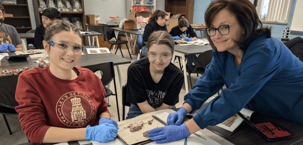 Participants Selah Lewis and Amelia Nemuras with Dr. Quinn.