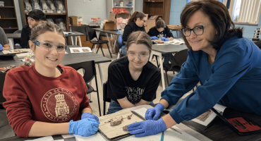 Participants Selah Lewis and Amelia Nemuras with Dr. Quinn.