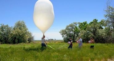 In this 2017 Montana State University file photo, MSU Eclipse Ballooning Project team members prepare to launch a high-altitude balloon during a test flight prior to the 2017 total solar eclipse near Rexburg, Idaho.