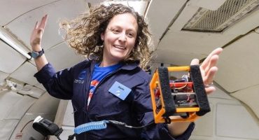 Karin M. Paquin demonstrates zero gravity. Courtesy photo