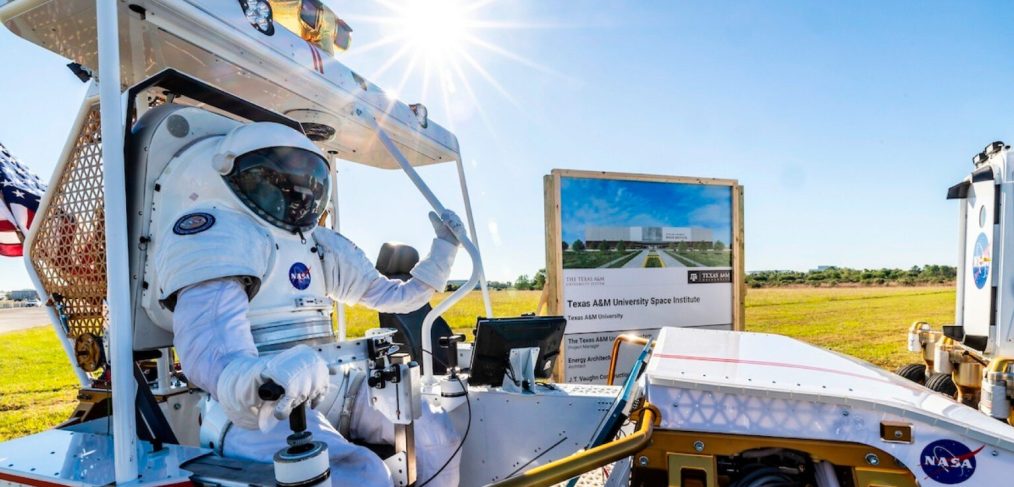 Texas A&M University Space Institute - Astronaut Seated on Lunar Rover