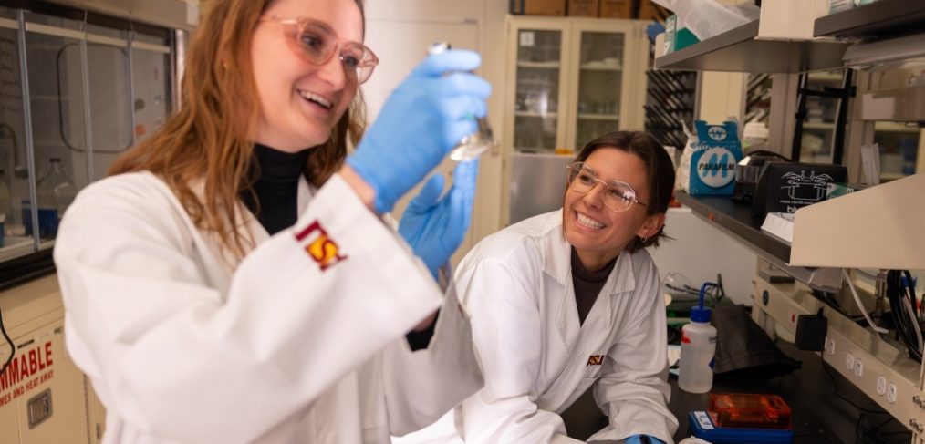 School of Earth and Space Exploration Graduate Associate Katelyn Weeks and PhD candidate Emma Brown working in the lab. ASU photo