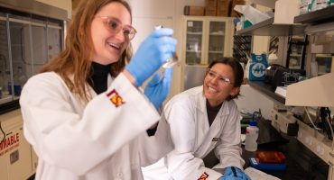 School of Earth and Space Exploration Graduate Associate Katelyn Weeks and PhD candidate Emma Brown working in the lab. ASU photo